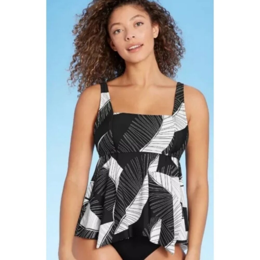 New without tags Kona Sol tankini swim top in size Medium (M). Shark bite hem